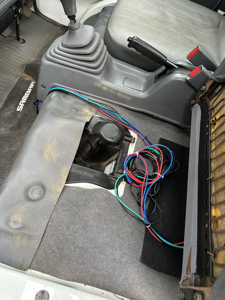 wires routed under the seat